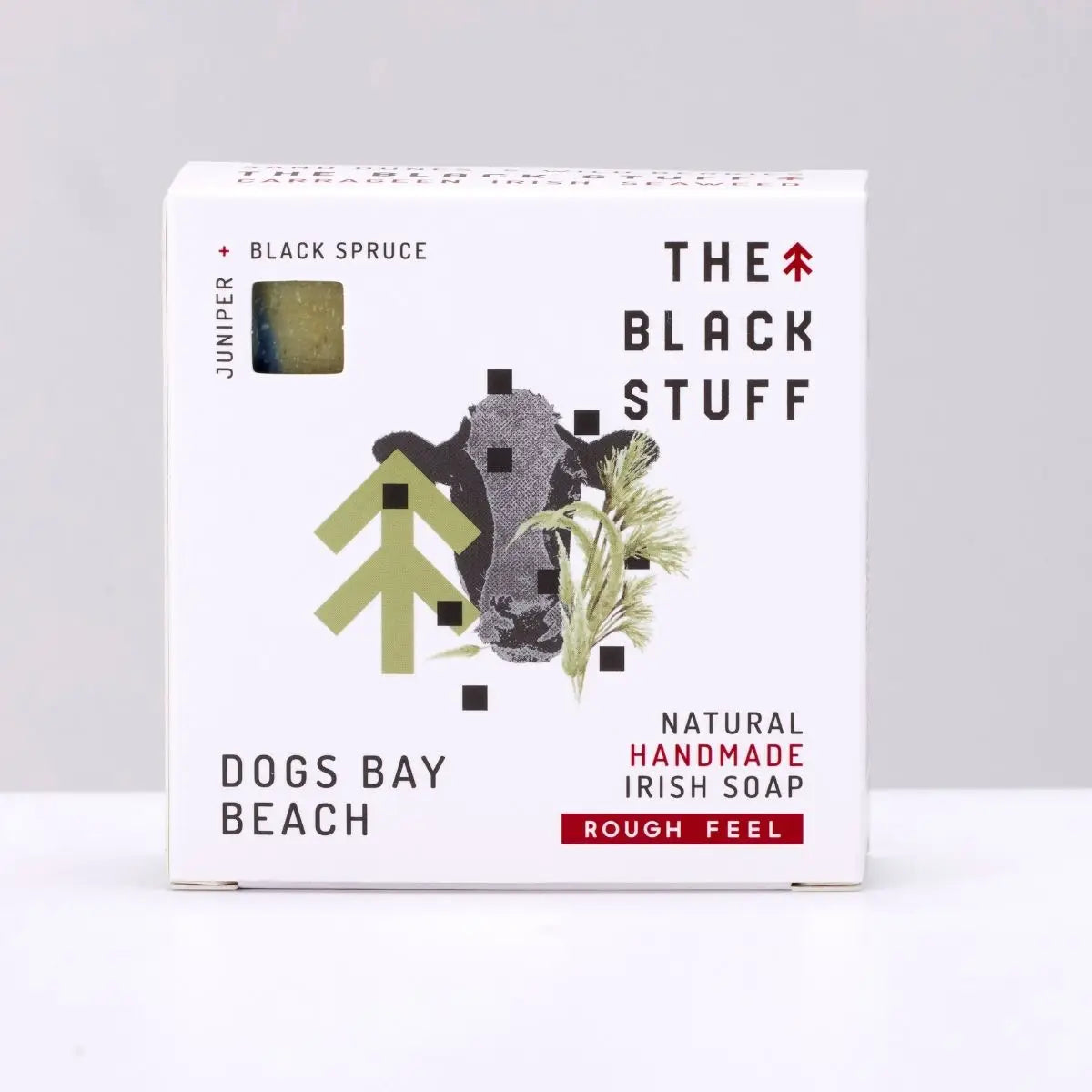 Eco-friendly The Black Stuff Soap - Dogs Bay Beach in square box, black spruce & juniper scent, sustainable skincare.