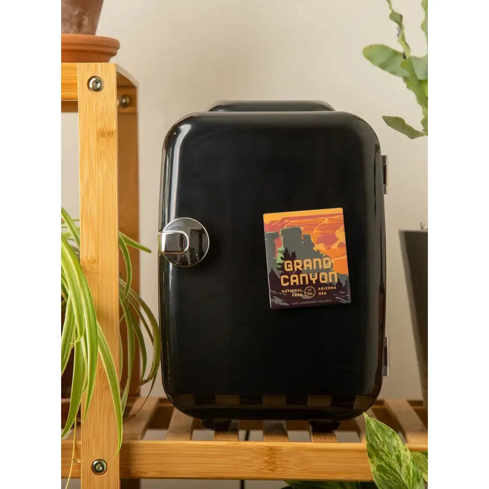 The Landmark Project Grand Canyon Magnet is a vintage-style piece featuring colorful rock formations and labeled "Grand Canyon National Park, Arizona, USA," showcasing themes of sustainability and environmental responsibility.