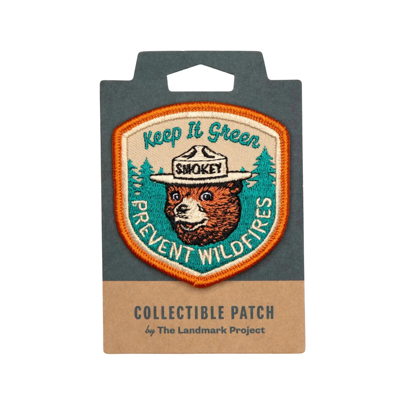The Landmark Project Smokey Bear Patch - Keep It Green is a collectible patch featuring Smokey Bear in a hat, with the text "Keep It Green" and "Prevent Wildfires," endorsed by the USDA Forest Service for wildfire prevention.