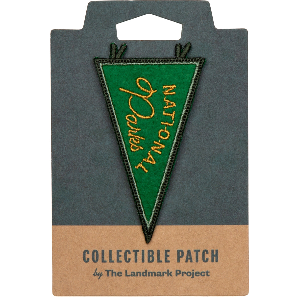 The Landmark Project National Parks Pennant Patch is a collectible iron-on patch featuring a green triangle with "National Parks" written in yellow text, perfect for National Park enthusiasts.