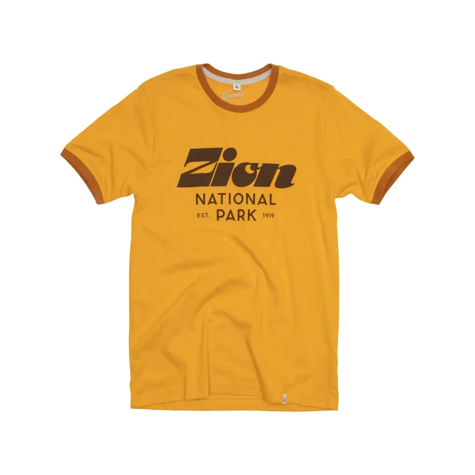 The Landmark Project Zion Script Type T-Shirt in yellow, featuring brown trim and bold brown text that reads "Zion National Park Est. 1919" on the front.
