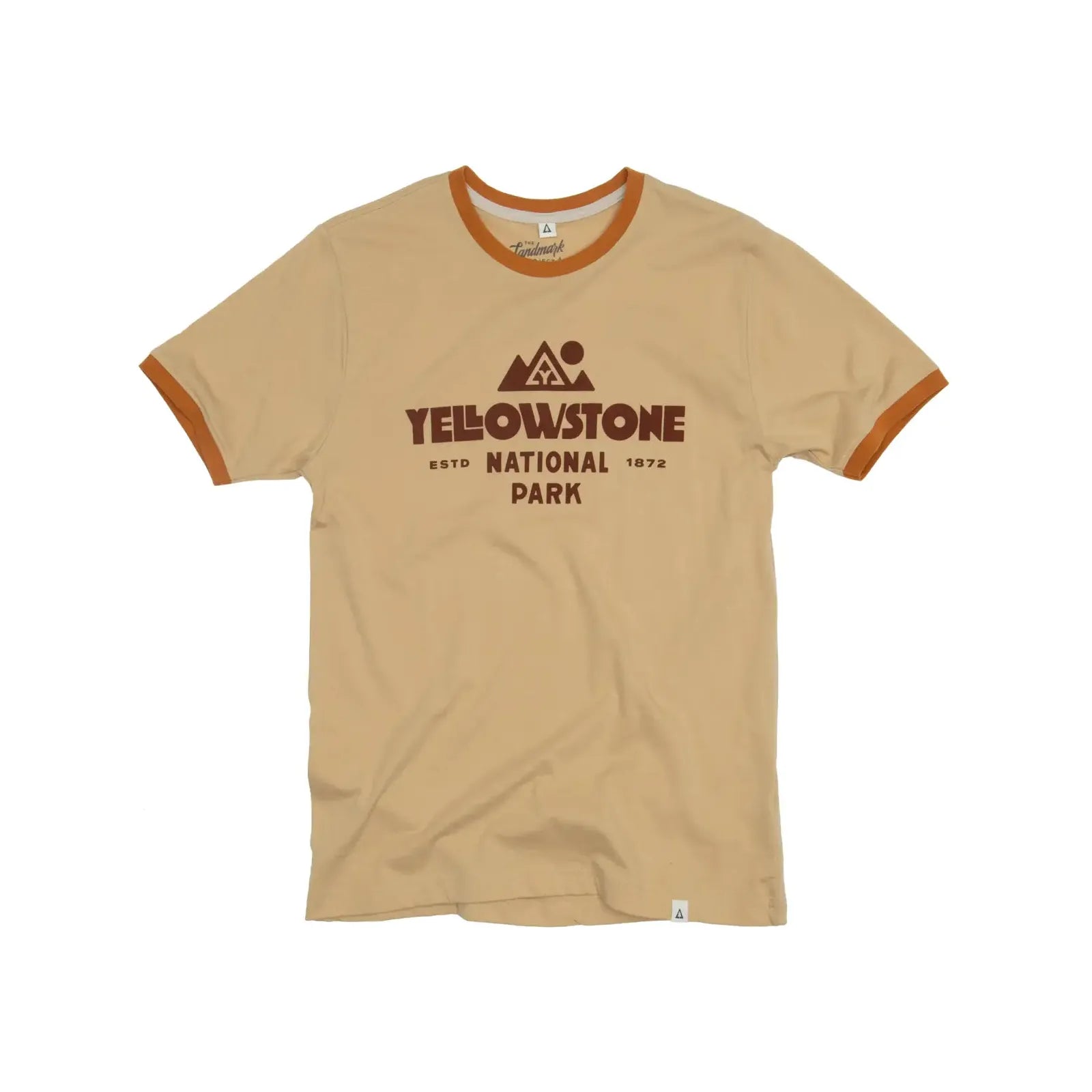 The Landmark Project Yellowstone Type Ringer T-Shirt is a beige tee with orange trim, featuring the text "Yellowstone National Park" and a mountain graphic in brown, sustainably made for eco-conscious adventurers.