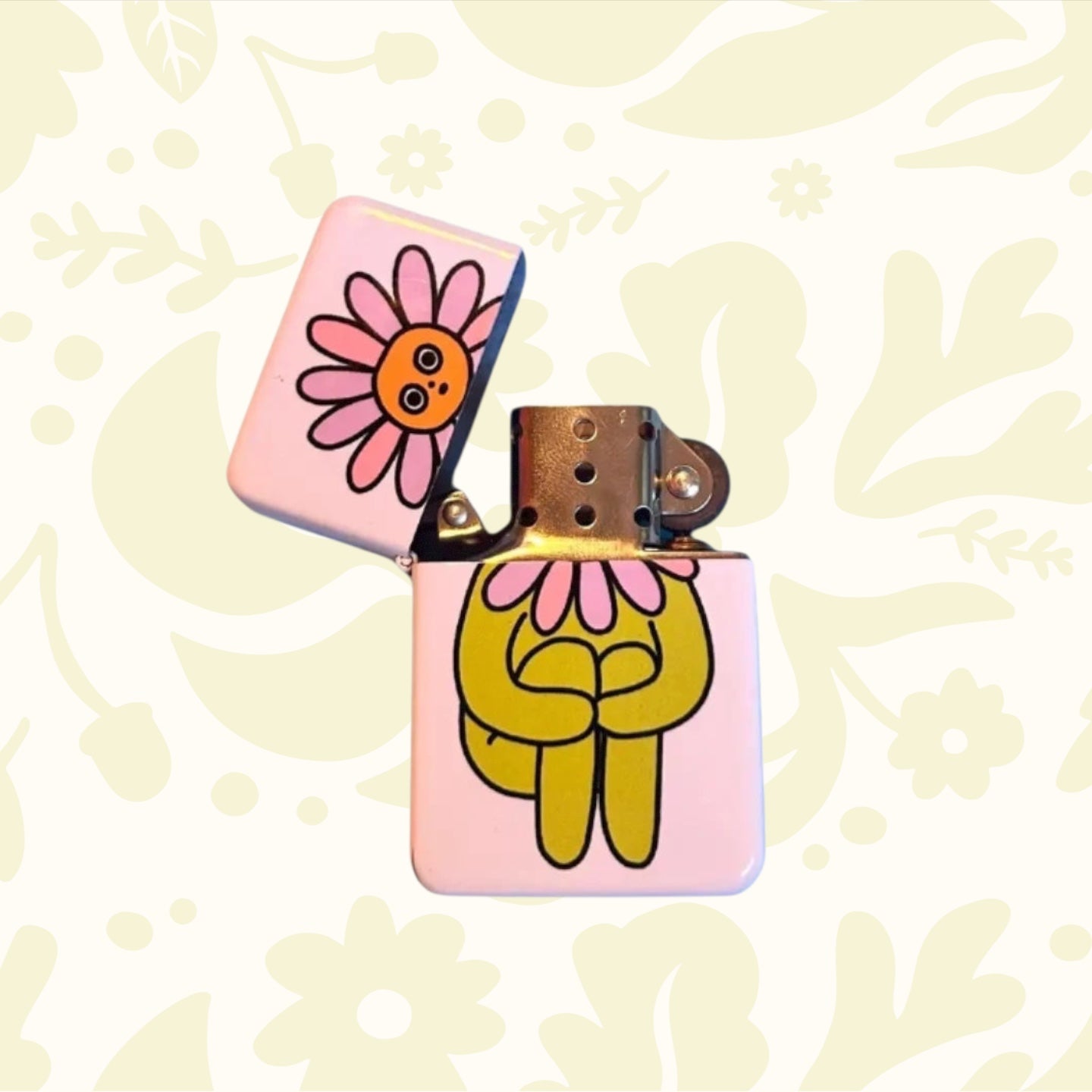 Peach Fuzz Flower Boy Lighter (TBC 2026): vintage-style lighter with yellow cartoon flower and pink smiling face.