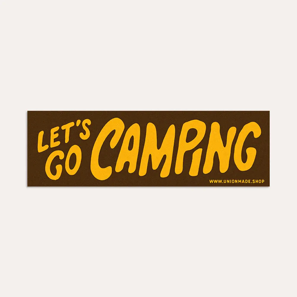 Brown Union Made bumper sticker with bold yellow "LETS GO CAMPING" text and small website URL, perfect for camping gear or cars.