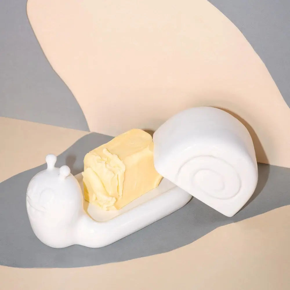 Third Drawer Down UK x Hattie Stewart snail butter dish, whimsical ceramic with removable shell lid for kitchen decor.