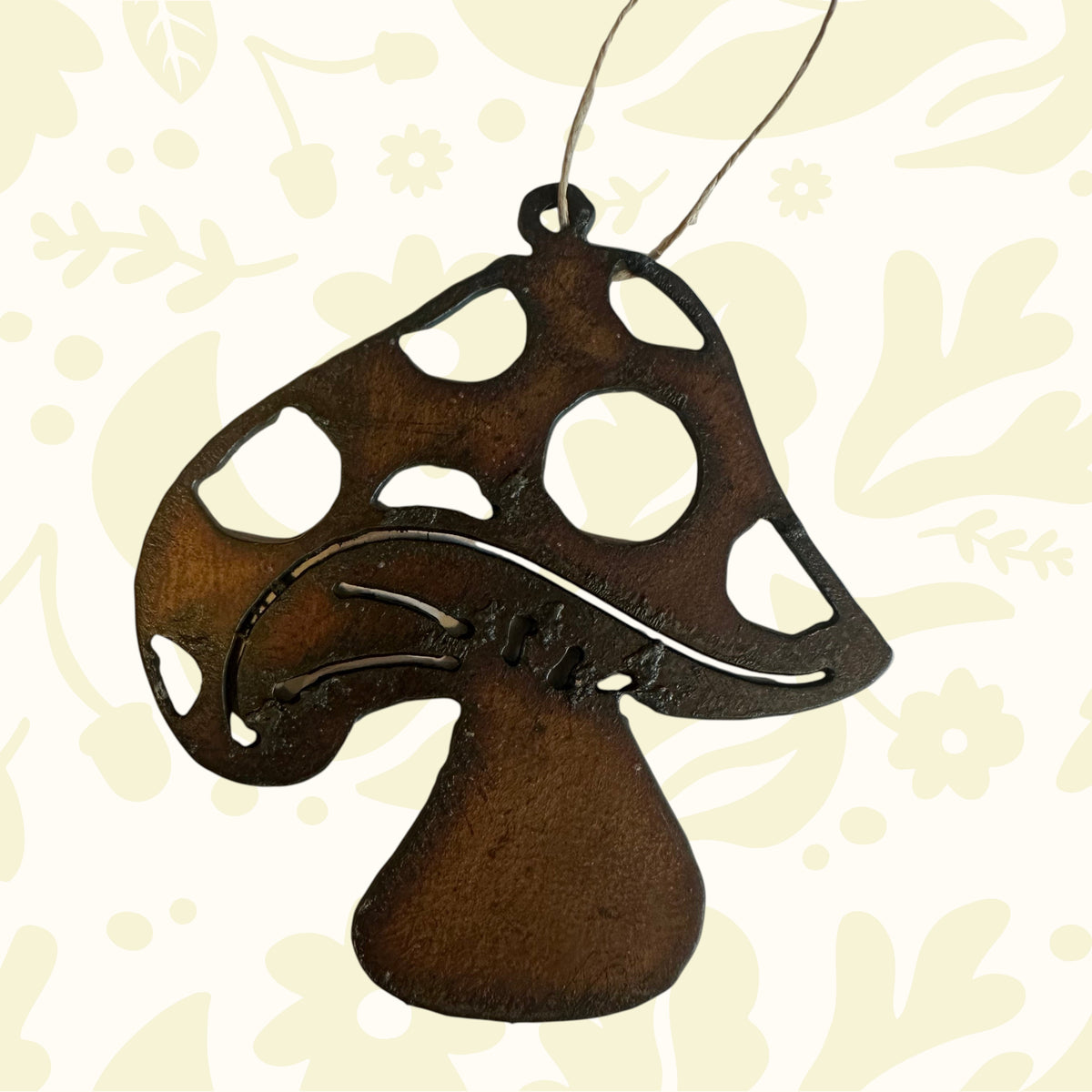 Steel Brown whimsical mushroom with cut-out dots design on a white background