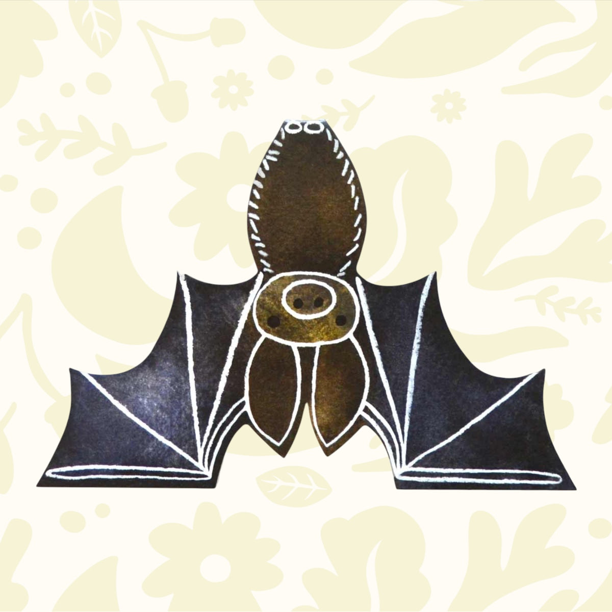 image shows unclose details of a bat shaped card.