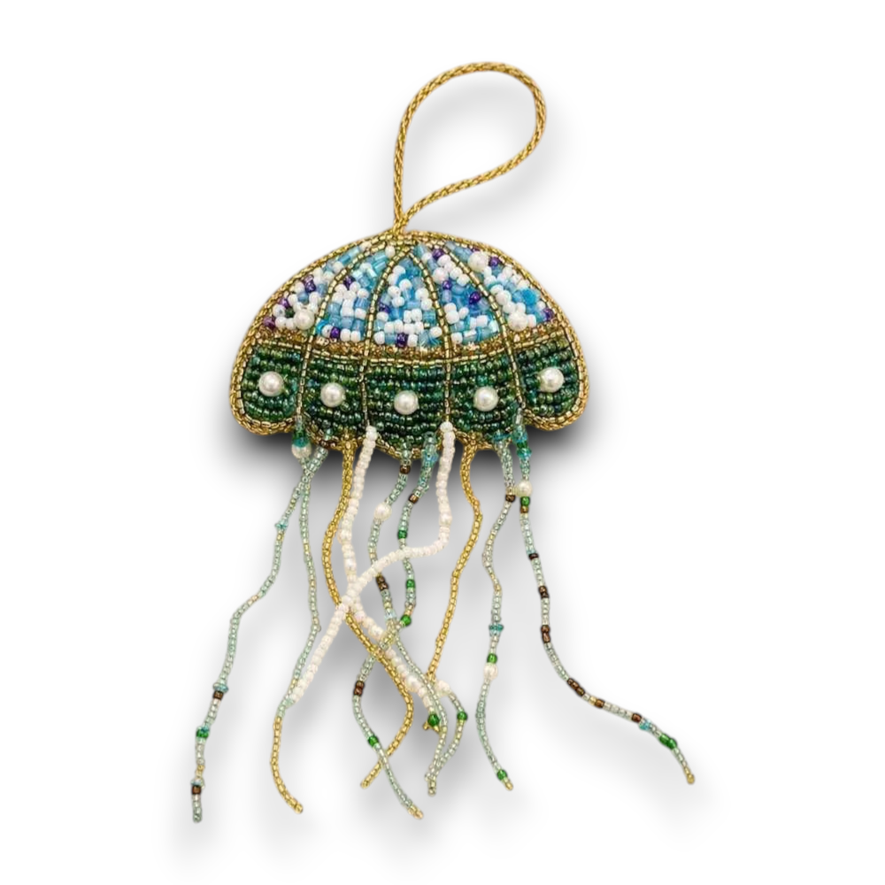 Forager Provisions LTD hanging jellyfish Christmas ornament with blue, green, and gold beads and dangling tentacles.