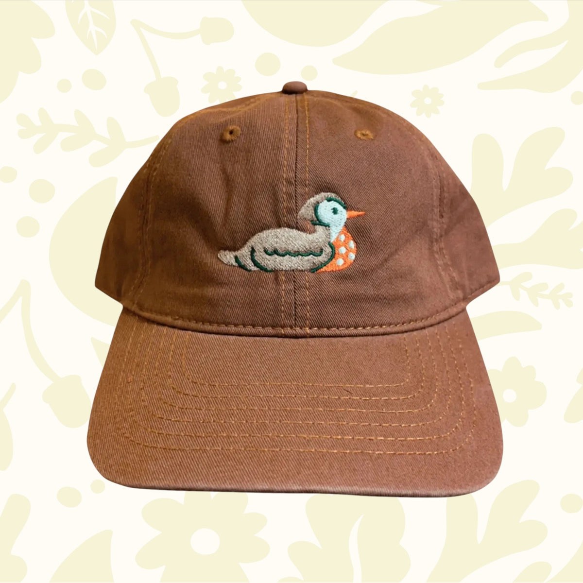 Forager Provisions LTD brown cotton ball cap featuring a playful embroidered duck design on the front panel.