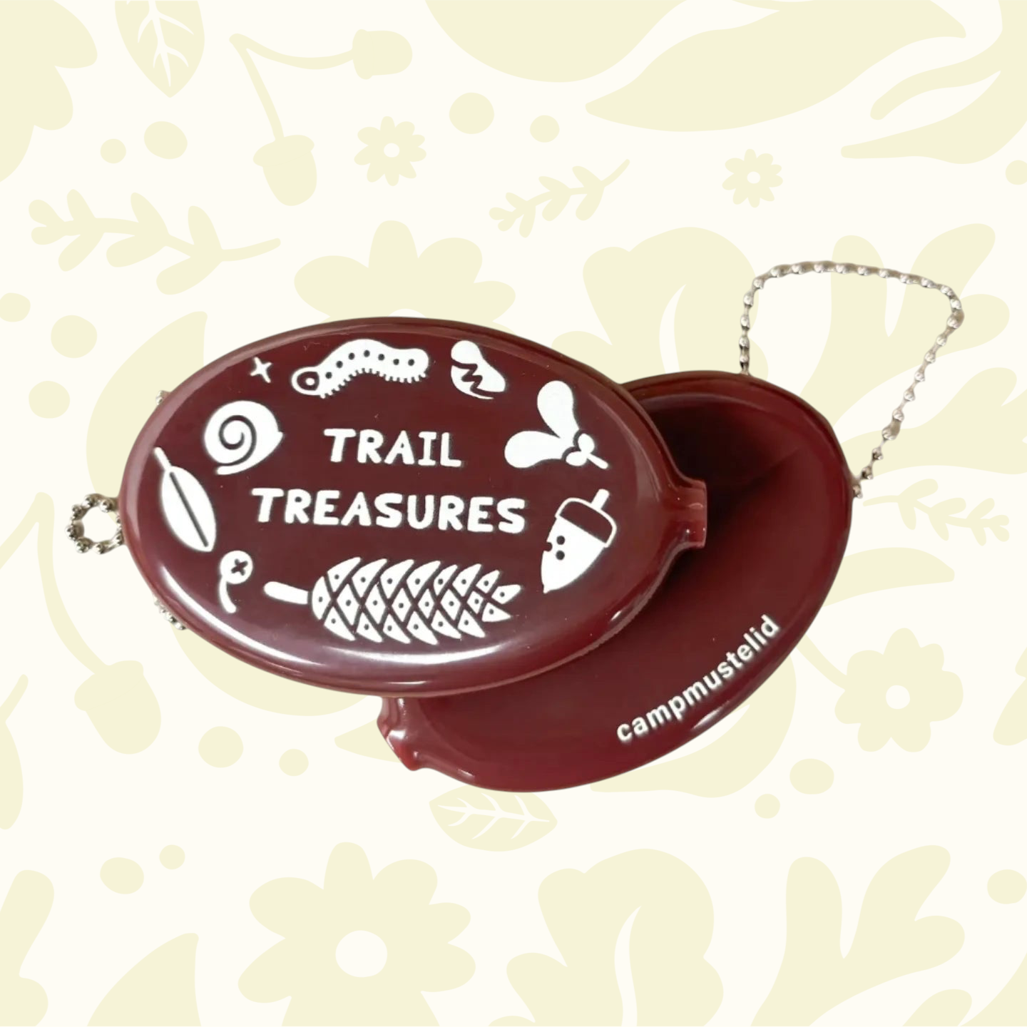 Forager Provisions LTD Camp Mustelid brown rubber snap-top wallet with Trail Treasures text and nature illustrations.