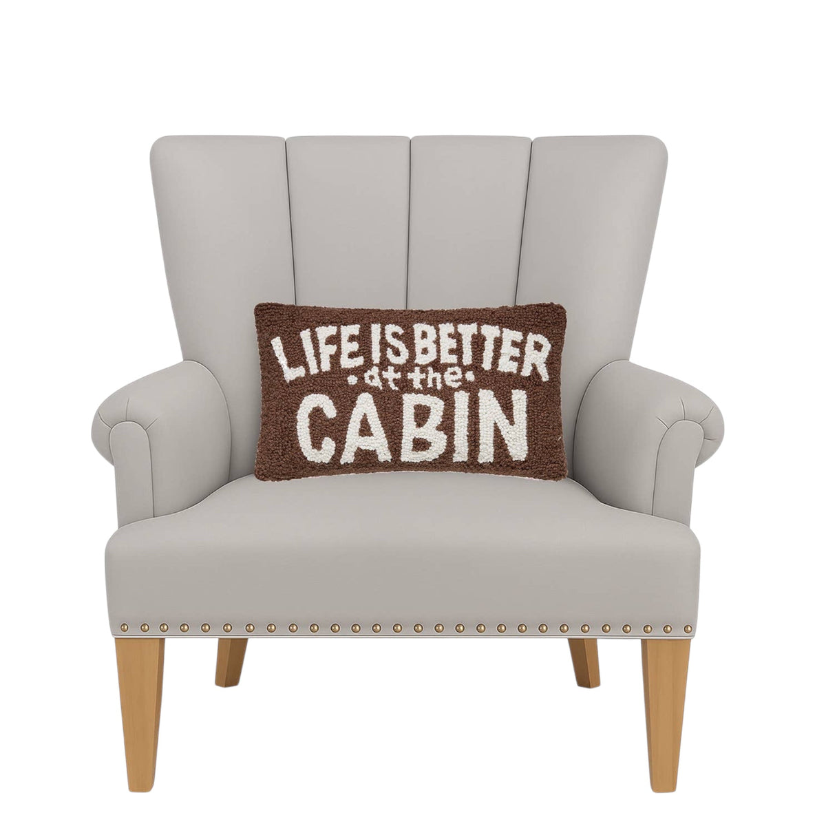 Forager Provisions LTD Life On Cabin rectangular wool hooked throw pillow with white text on a brown background