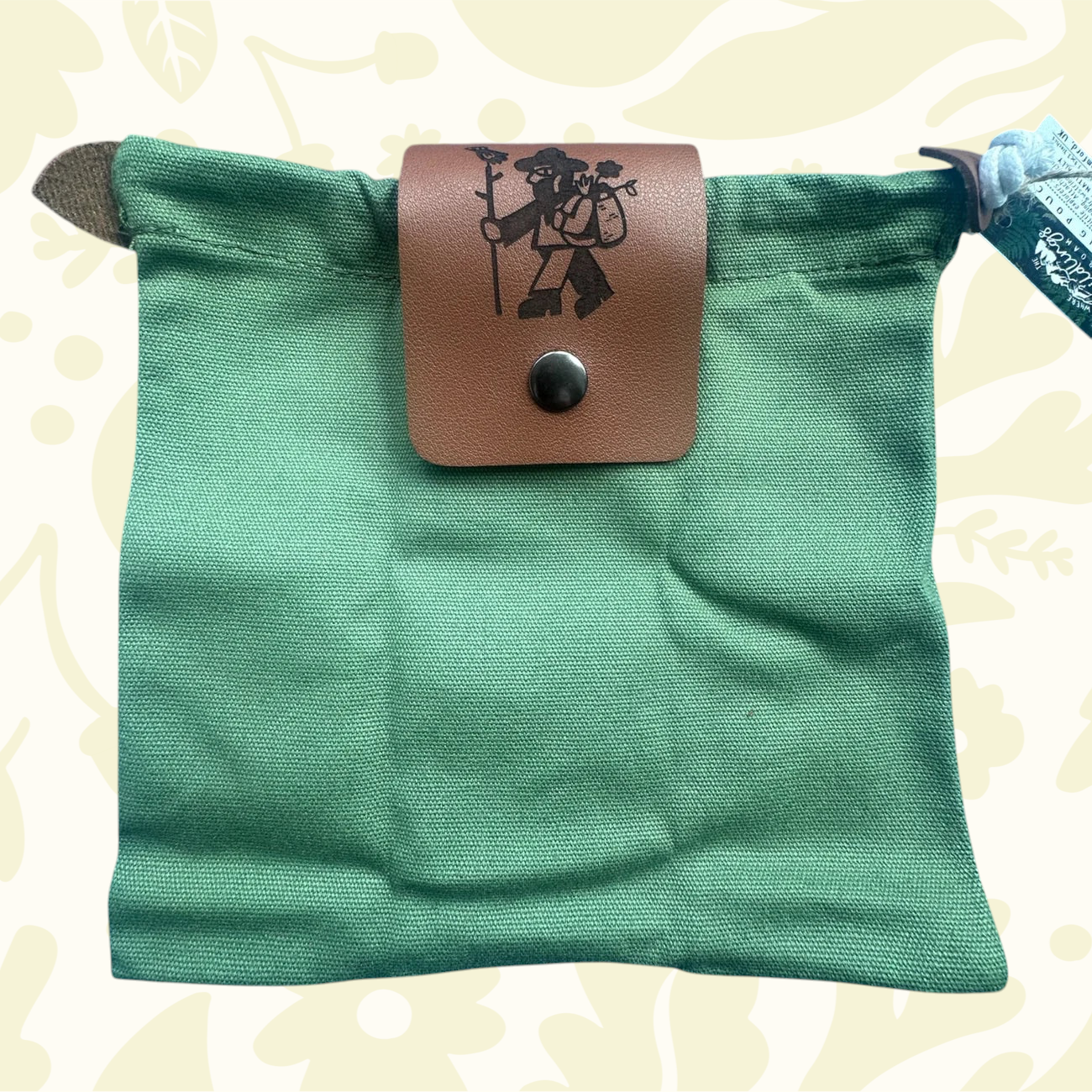 Forager Provisions LTD natural canvas forage bag with vegan leather popper closure featuring a laser-engraved design.