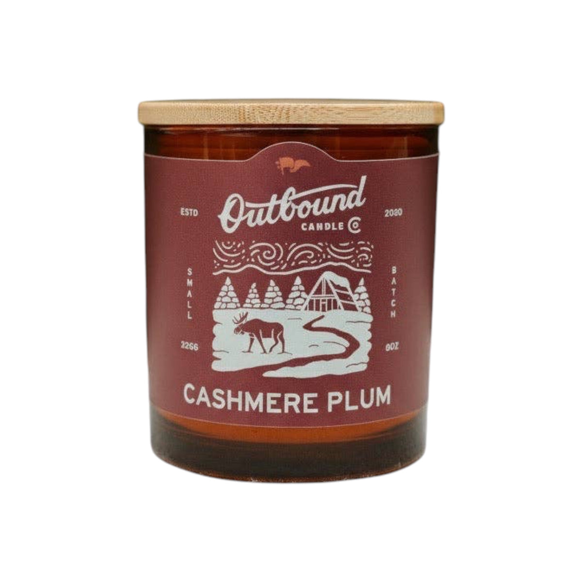 Forager Provisions LTD 8oz Cashmere Plum soy candle in an amber glass jar with a bamboo lid and winter-themed label.