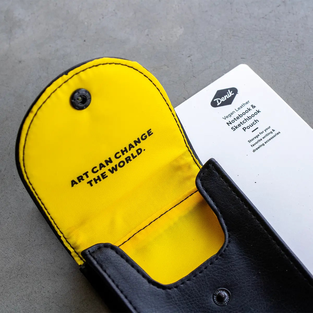Forager Provisions LTD Denik black vegan leather notebook pouch with a bright yellow interior and inspiring quote.