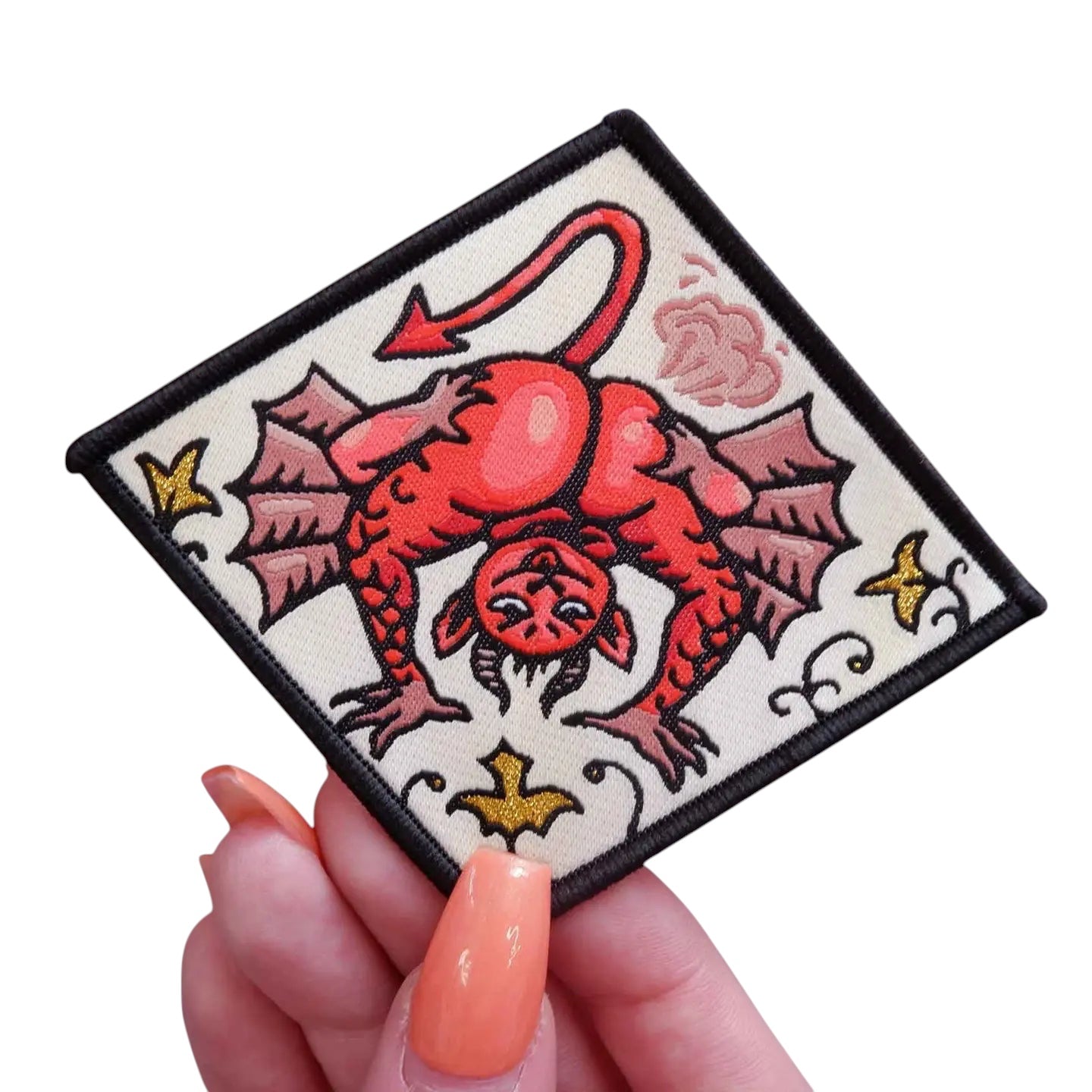 Forager Provisions LTD Cat Coven Fart Demon iron-on embroidered patch featuring a red devil character on cream fabric