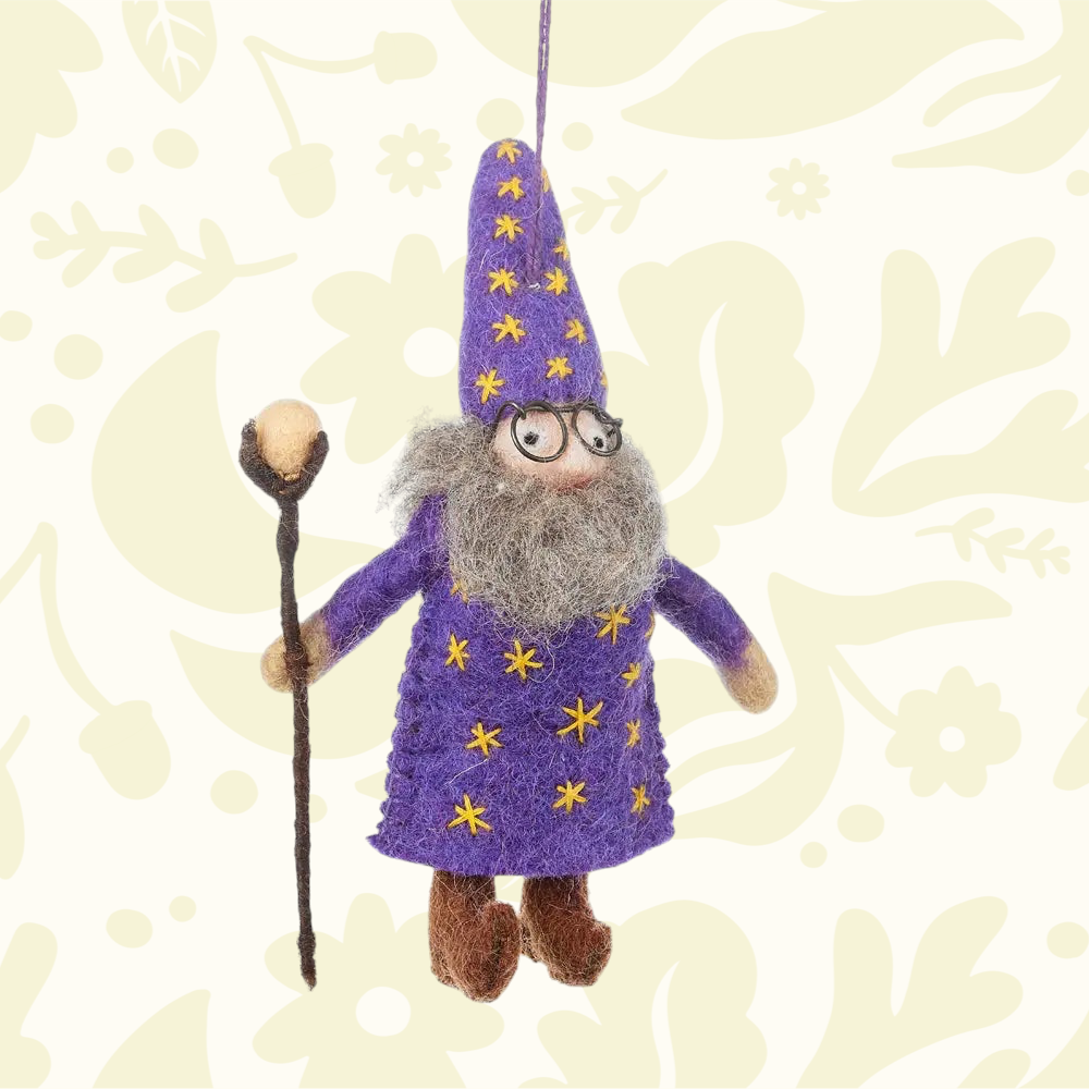 Handmade Felt So Good Wendall the Wizard hanging ornament with glasses, gray beard, purple robe and starry wizard hat.