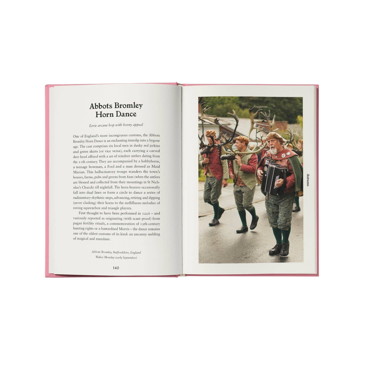 Open hardback book by Forager Provisions LTD showing the Abbots Bromley Horn Dance with men in traditional costumes