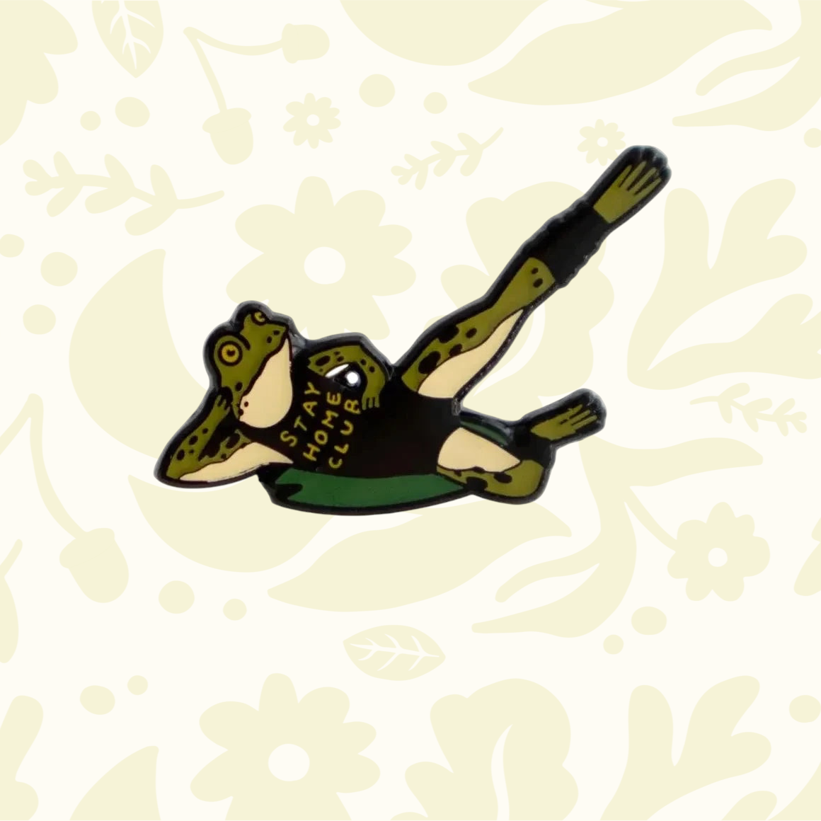 Forager Provisions LTD enamel pin featuring a green frog doing a leg lift exercise in a black leotard.