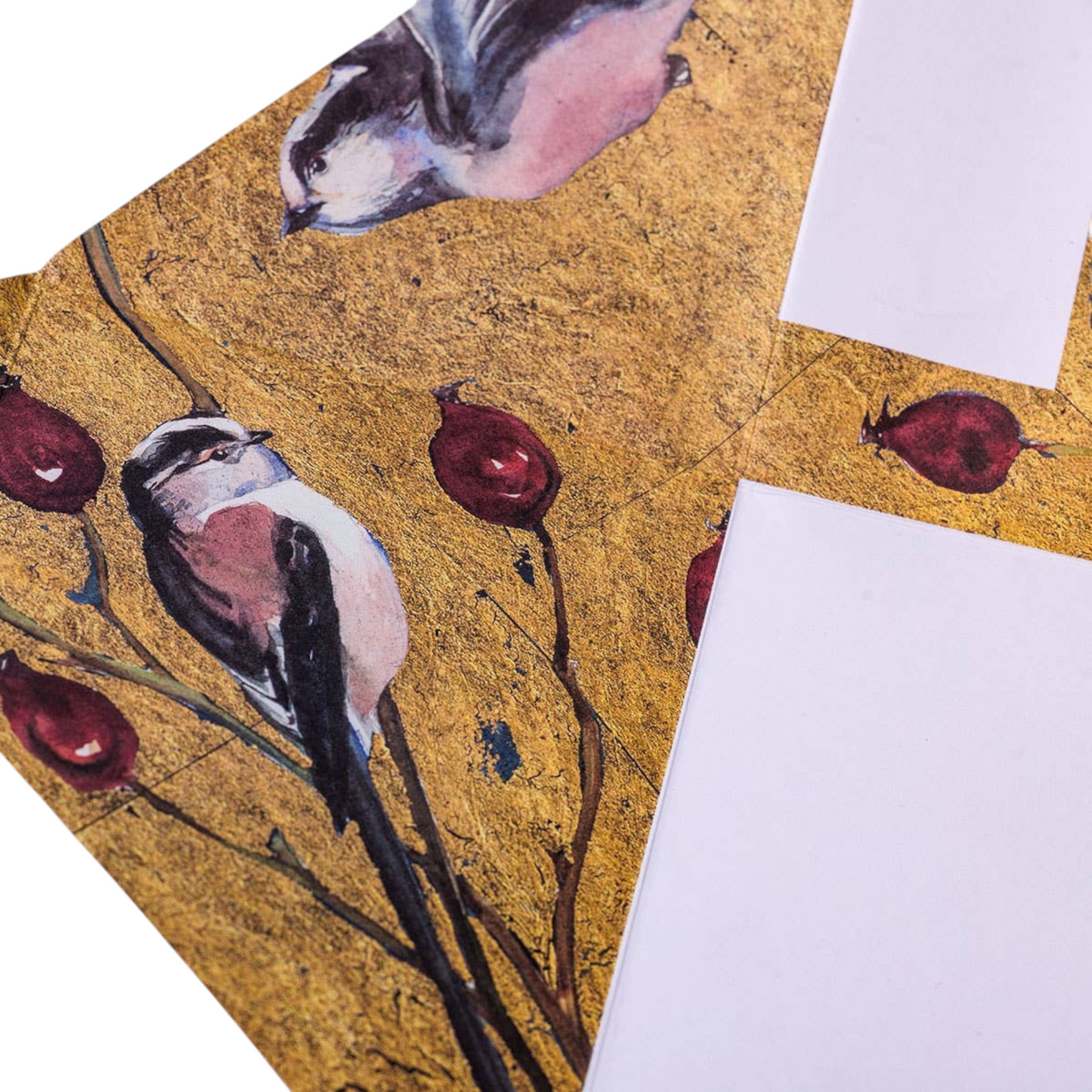 Forager Provisions LTD Pigeonposted folding letter set featuring golden bird and berry illustrations on paper.