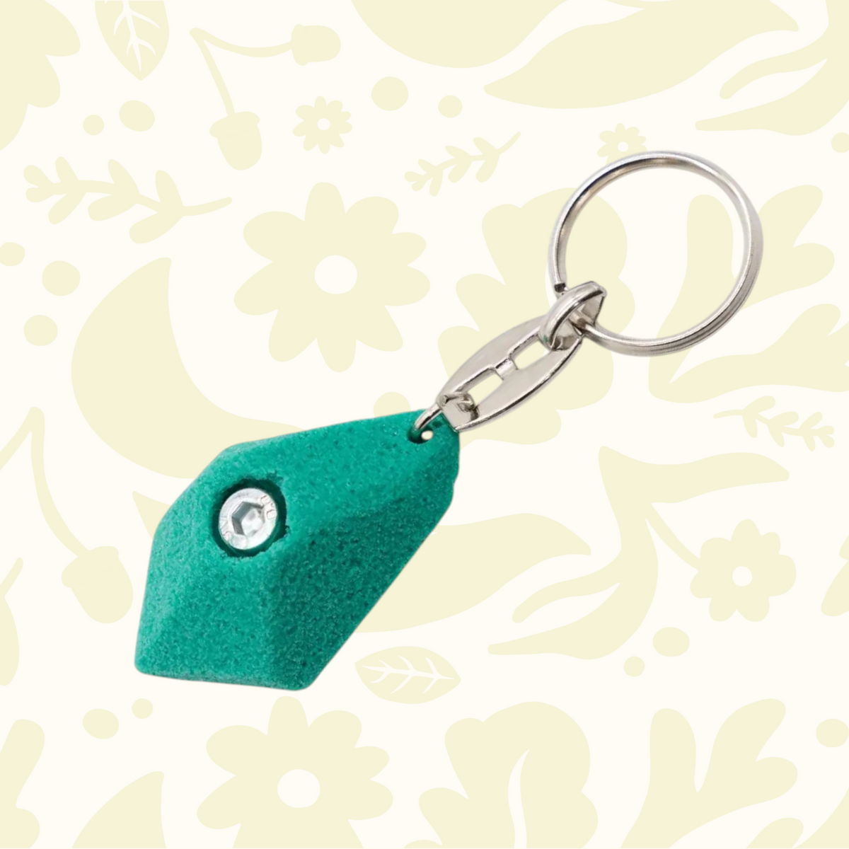 Forager Provisions LTD Seven Peaks green climbing hold keychain with a metal bolt and secure split ring.