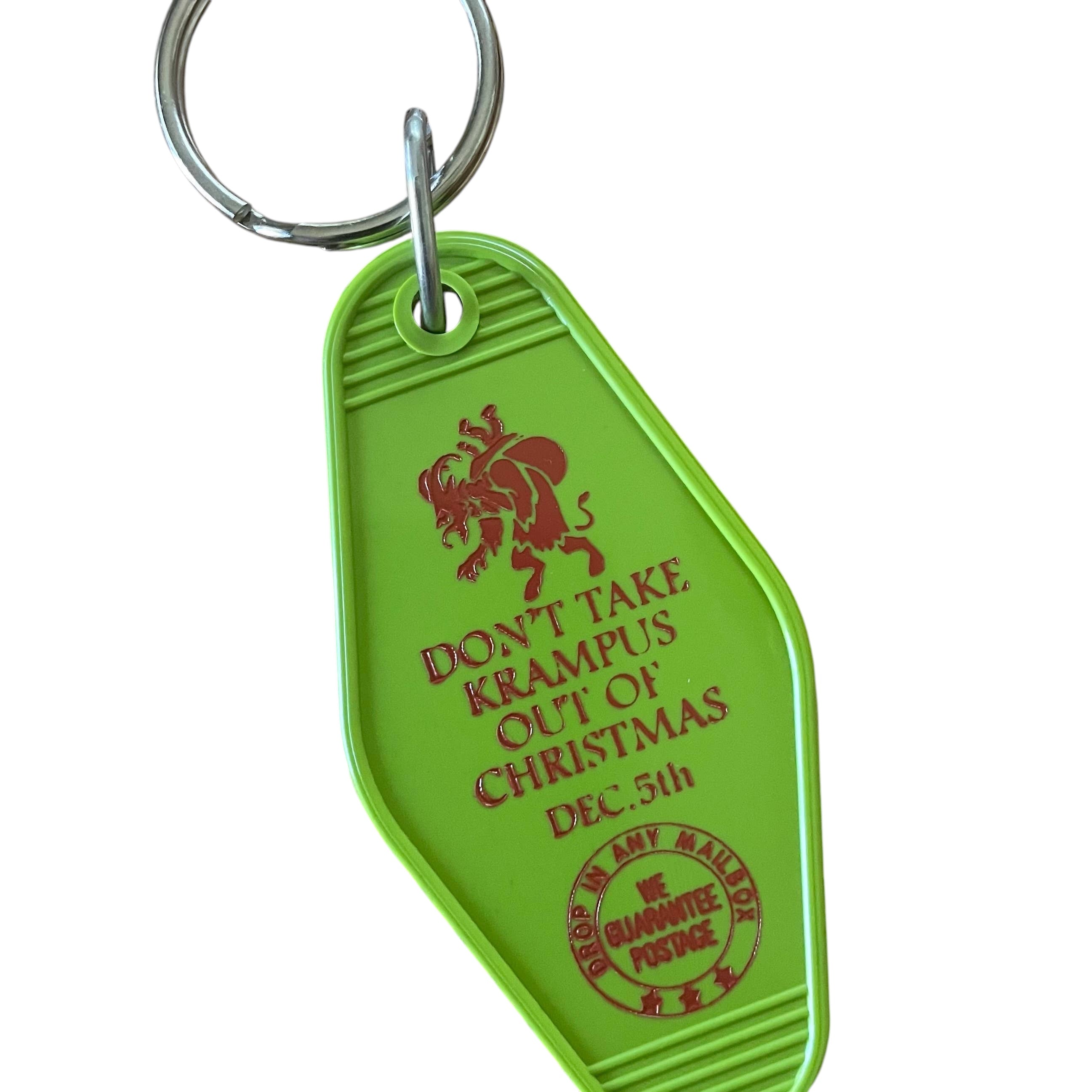 Forager Provisions LTD vintage style green plastic motel key fob with red Krampus graphic and text