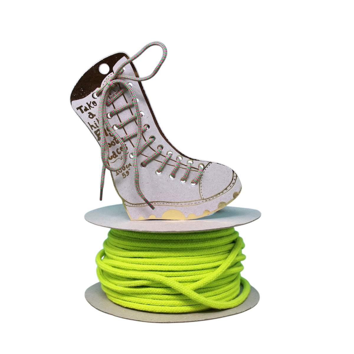 Forager Provisions LTD Ark Colour Design green and pink patterned boot laces on a large spool with a boot display.