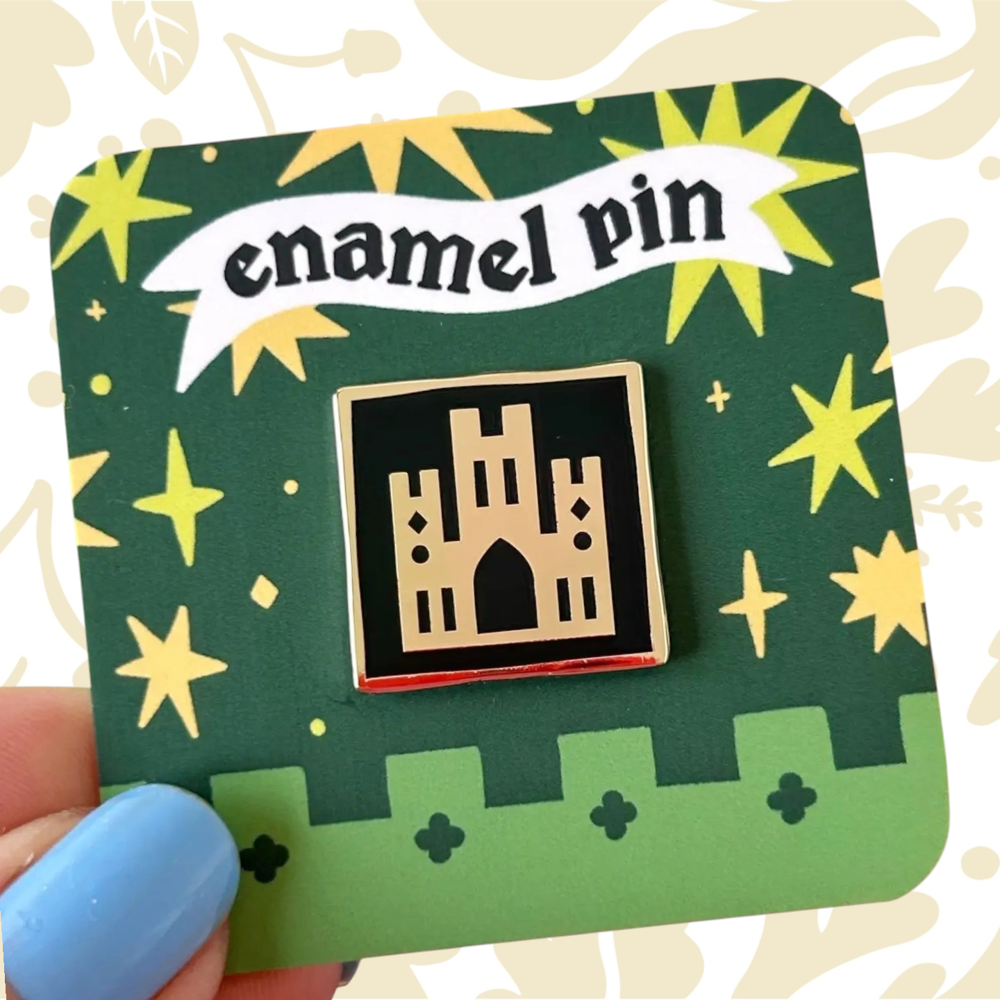 Forager Provisions LTD Stacey McEvoy Caunt enamel pin featuring a black and gold medieval abbey architectural design.