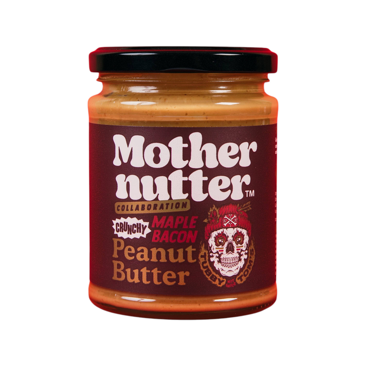 Forager Provisions LTD Mothernutter crunchy maple bacon peanut butter in a glass jar with a skull logo label.