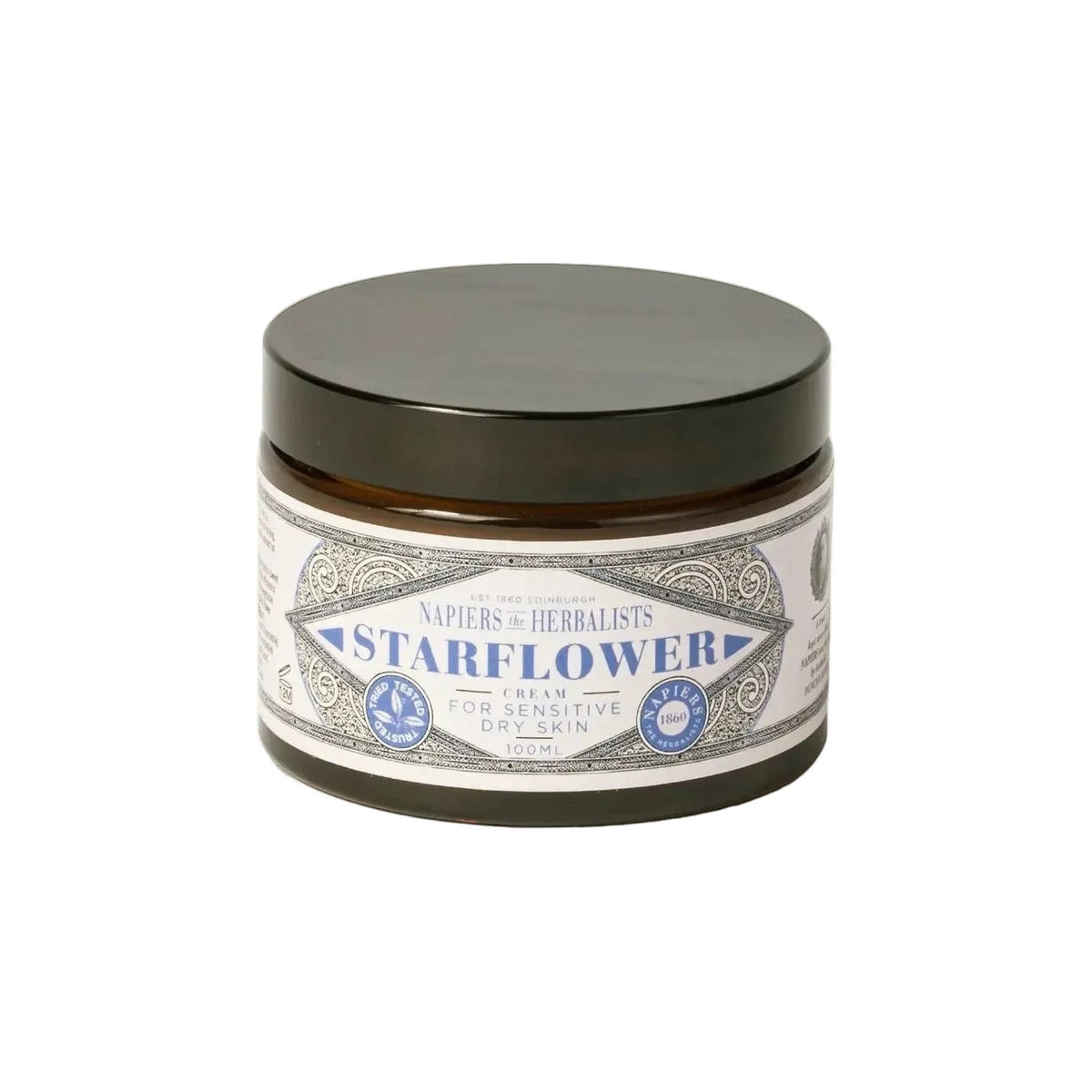 Forager Provisions LTD Napiers Starflower Dry Skin Cream in a dark glass jar with a black lid on a floral background.