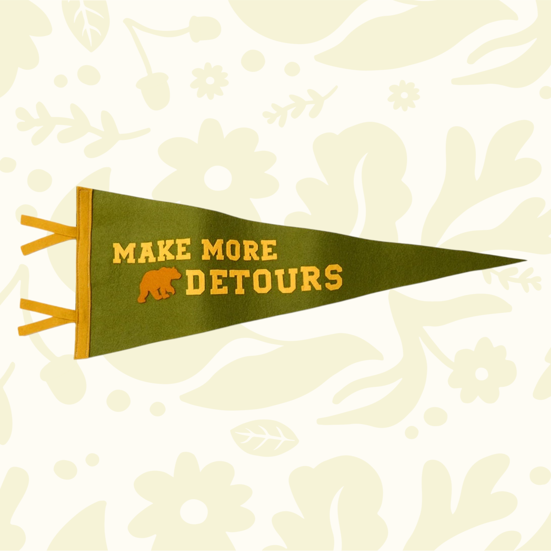 Forager Provisions LTD wool felt pennant in olive green with Make More Detours text and a bear icon