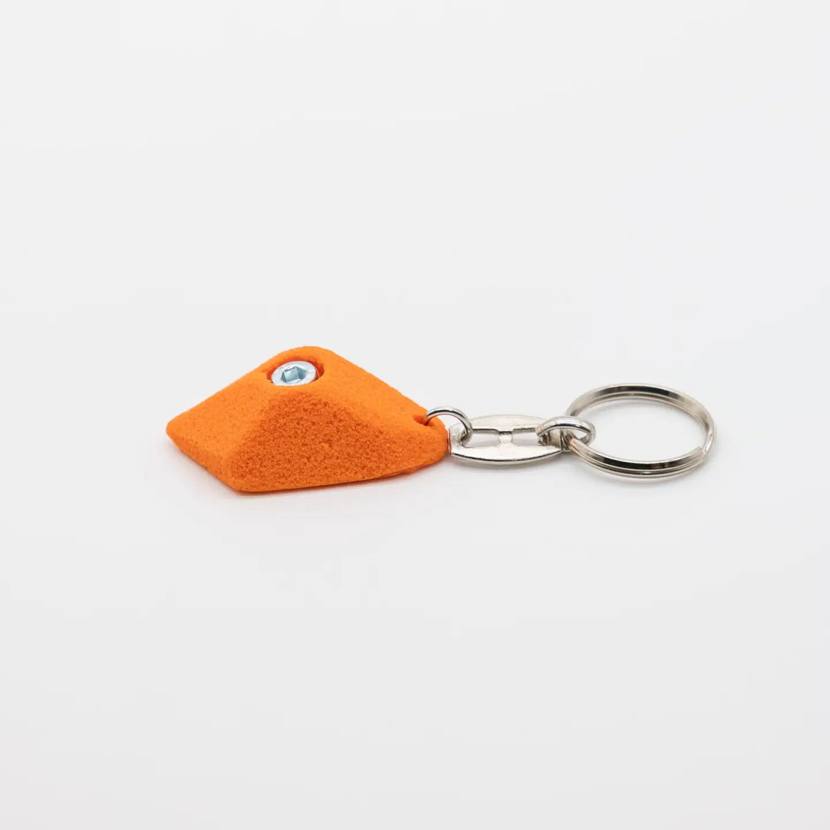 Forager Provisions LTD Seven Peaks orange climbing hold keychain with a metal split ring on a white background