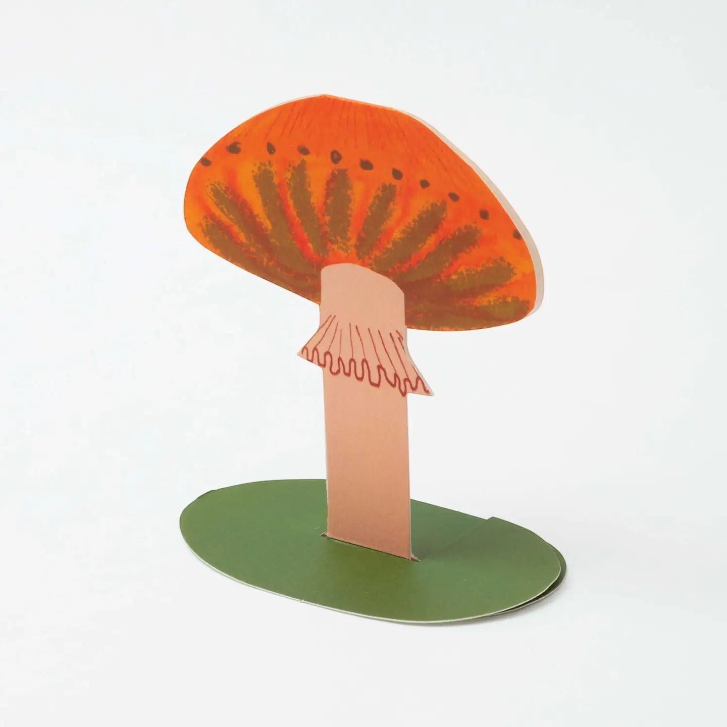 Forager Provisions LTD orange frilly mushroom stand-up greeting card with textured collage detail on a green base