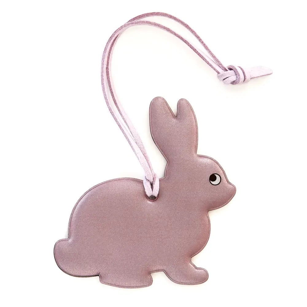 Forager Provisions LTD Firefly Sweden pink bunny reflective bag charm with a soft cord for attaching to backpacks.