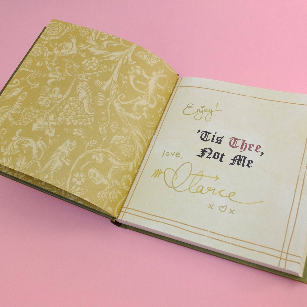 Forager Provisions LTD signed hardback book Tis Thee Not Me with gold medieval patterned endpapers on pink background