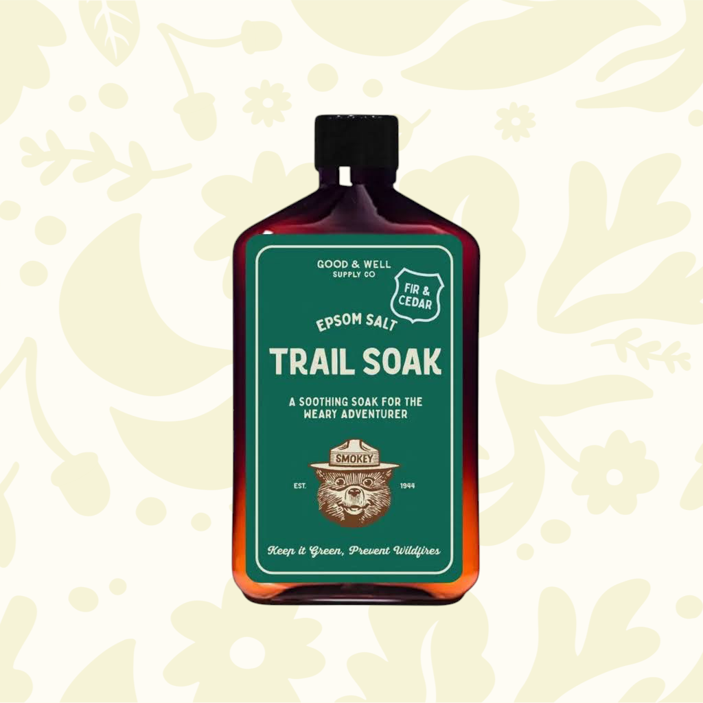 Forager Provisions LTD Good & Well Supply Co Smokey Bear fir and cedar epsom salt trail soak in an amber bottle.
