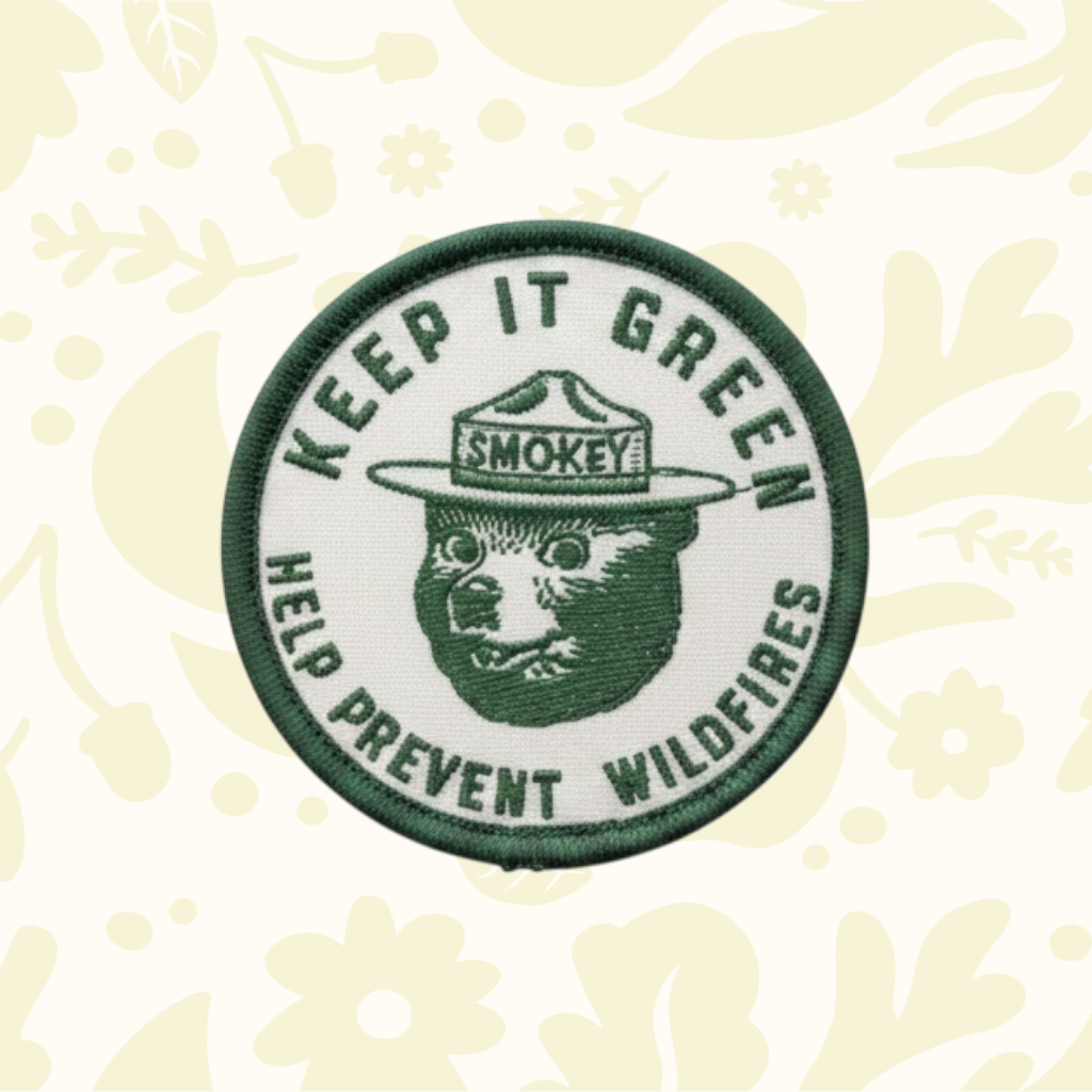 Forager Provisions LTD Smokey Bear Keep It Green embroidered patch on an olive green baseball cap