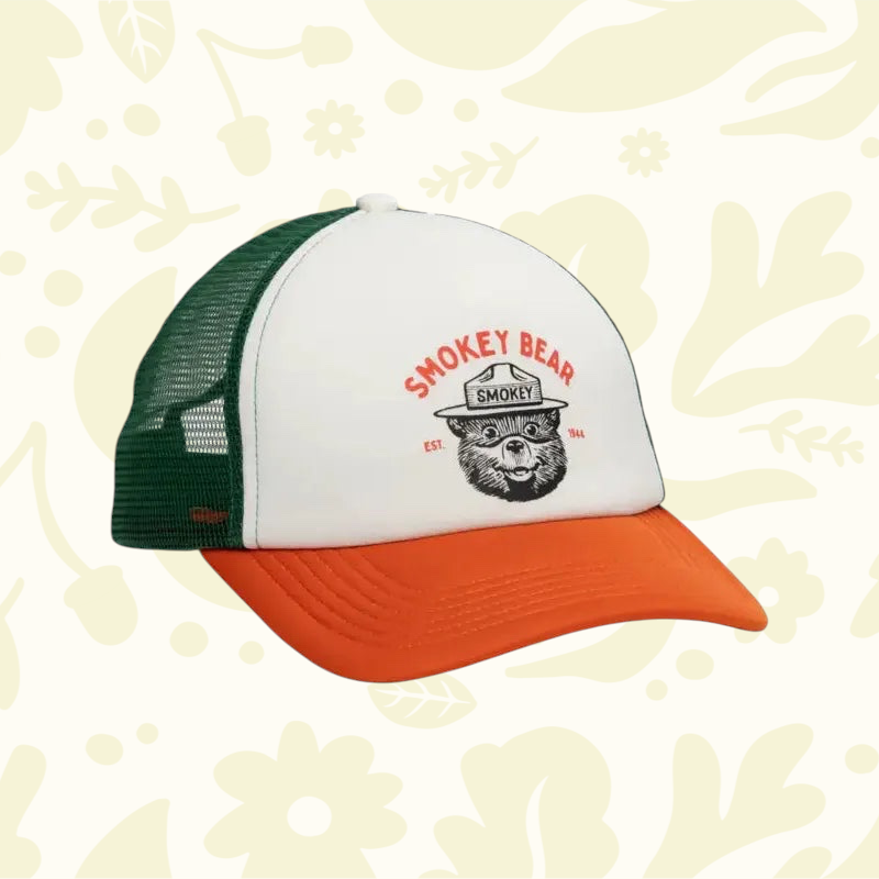Forager Provisions LTD Smokey Bear varsity foam trucker hat with white front, green mesh back, and orange brim.