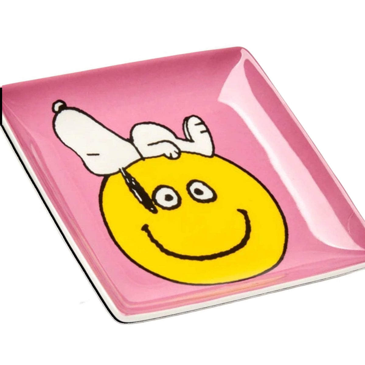 Forager Provisions LTD square ceramic trinket tray featuring a pink background with Snoopy on a yellow smiley face