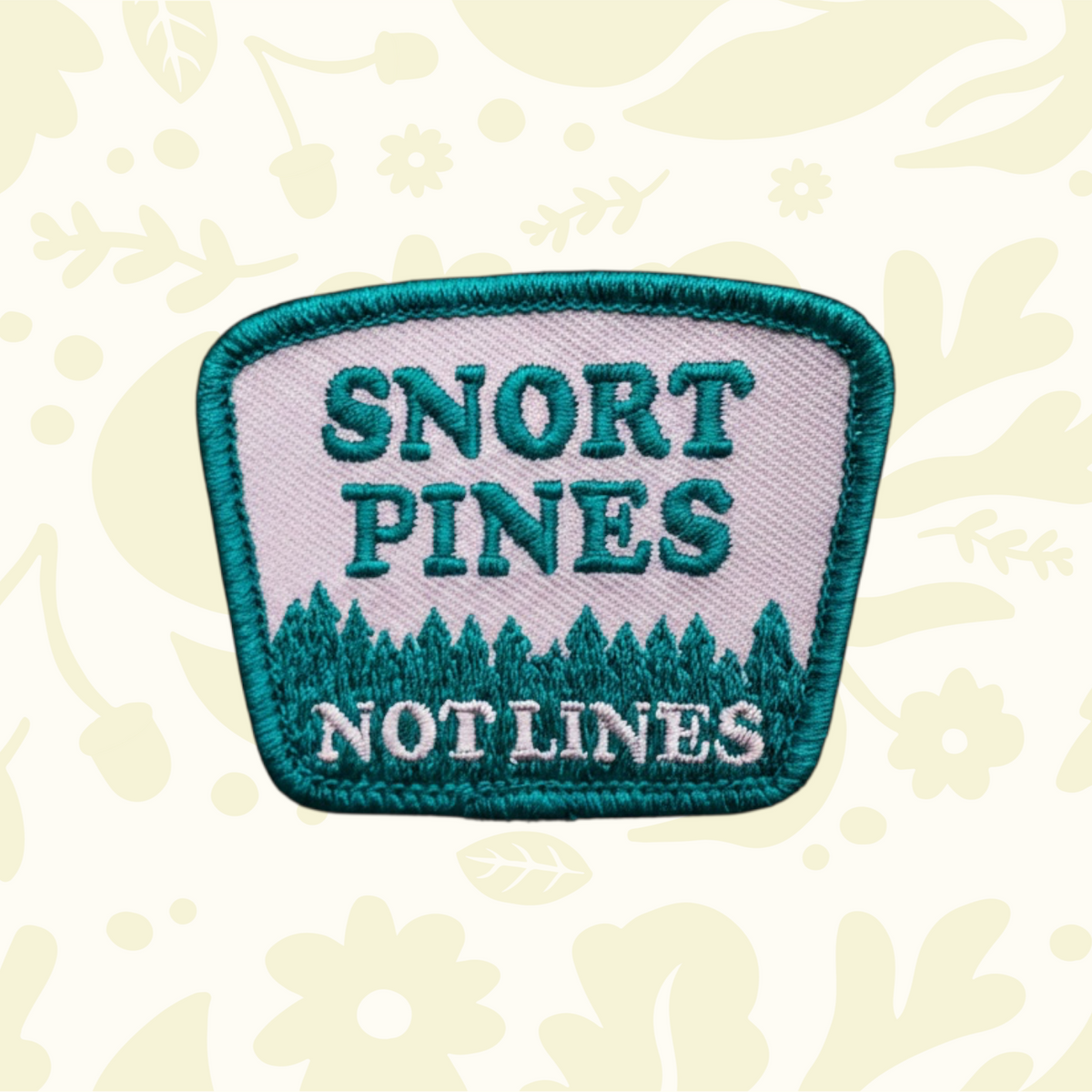 Forager Provisions LTD Hey Bear Outdoors embroidered patch featuring Snort Pines Not Lines text on a forest floor.