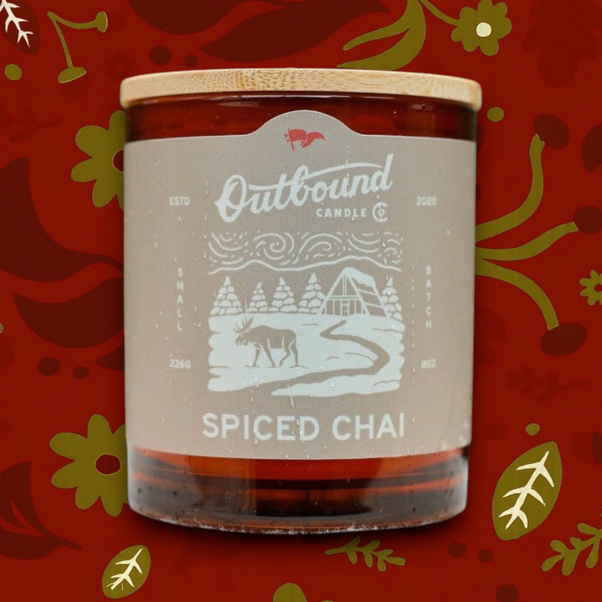 Forager Provisions LTD Outbound Candle Co Spiced Chai soy candle in an amber glass jar with a bamboo lid.