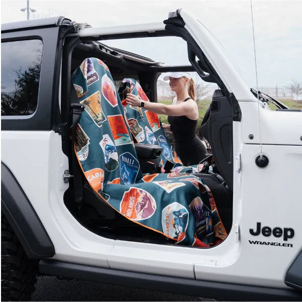 Forager Provisions LTD Sprints National Parks microfibre car seat cover towel installed in a white Jeep Wrangler