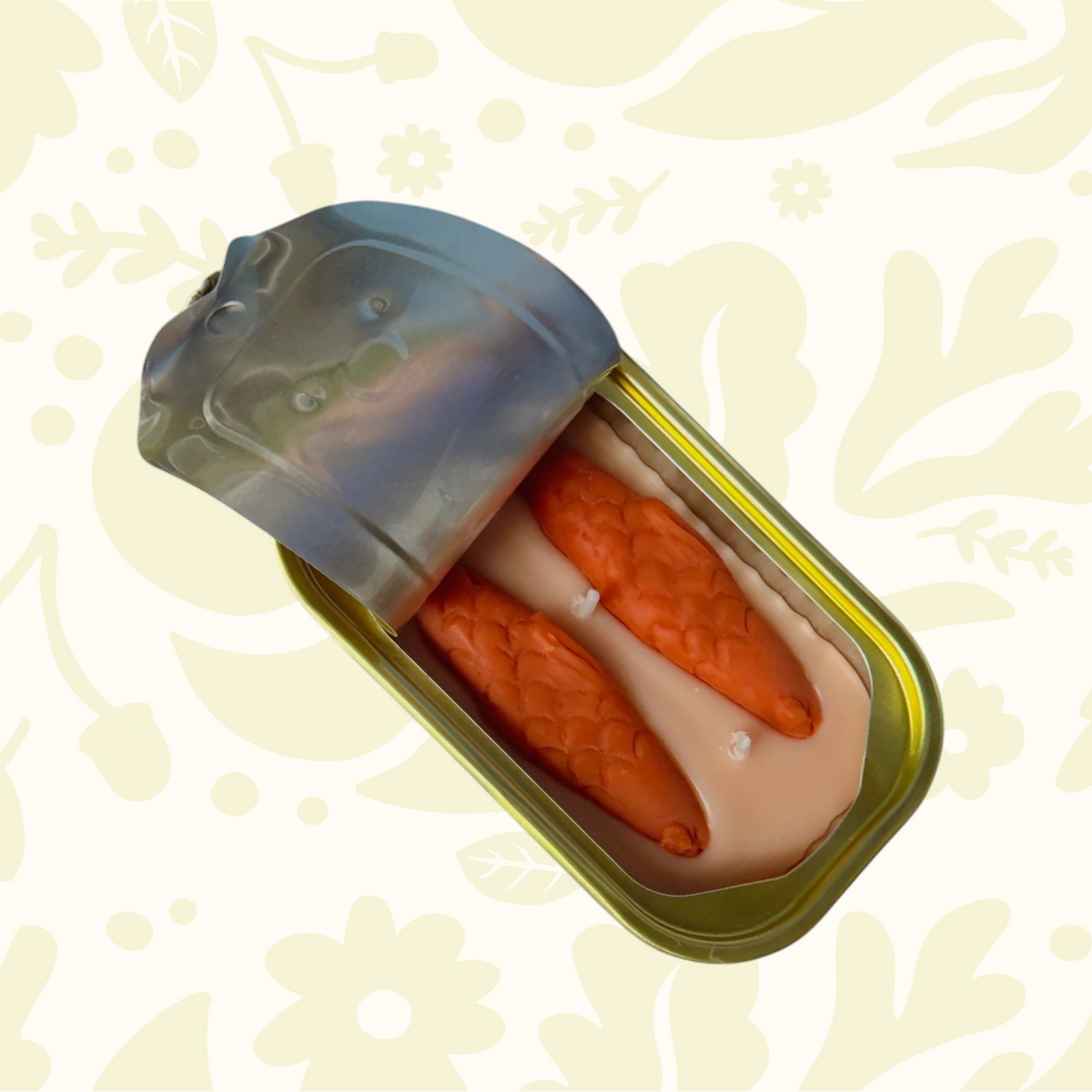 Forager Provisions LTD The Original Tinned Fish Candle in oakmoss and amber with sardine-shaped wax in a metal tin.
