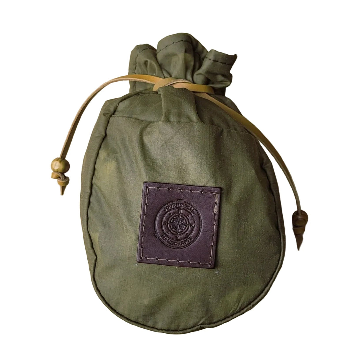 Journeyman Craft khaki green waxed canvas coffee pouch with leather patch—perfect for camping or outdoor coffee storage.