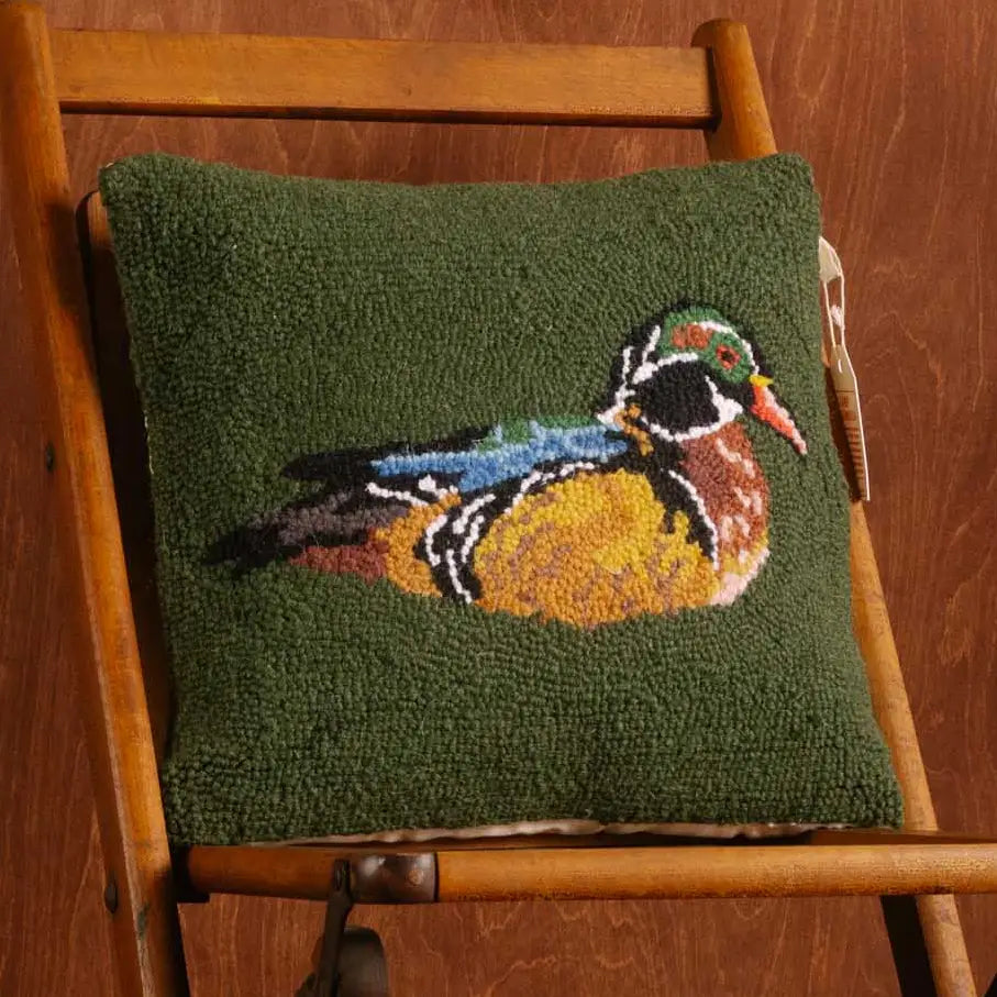 Forager Provisions LTD Camp Wandawega square hooked wool pillow featuring a colourful wood duck on a green background.