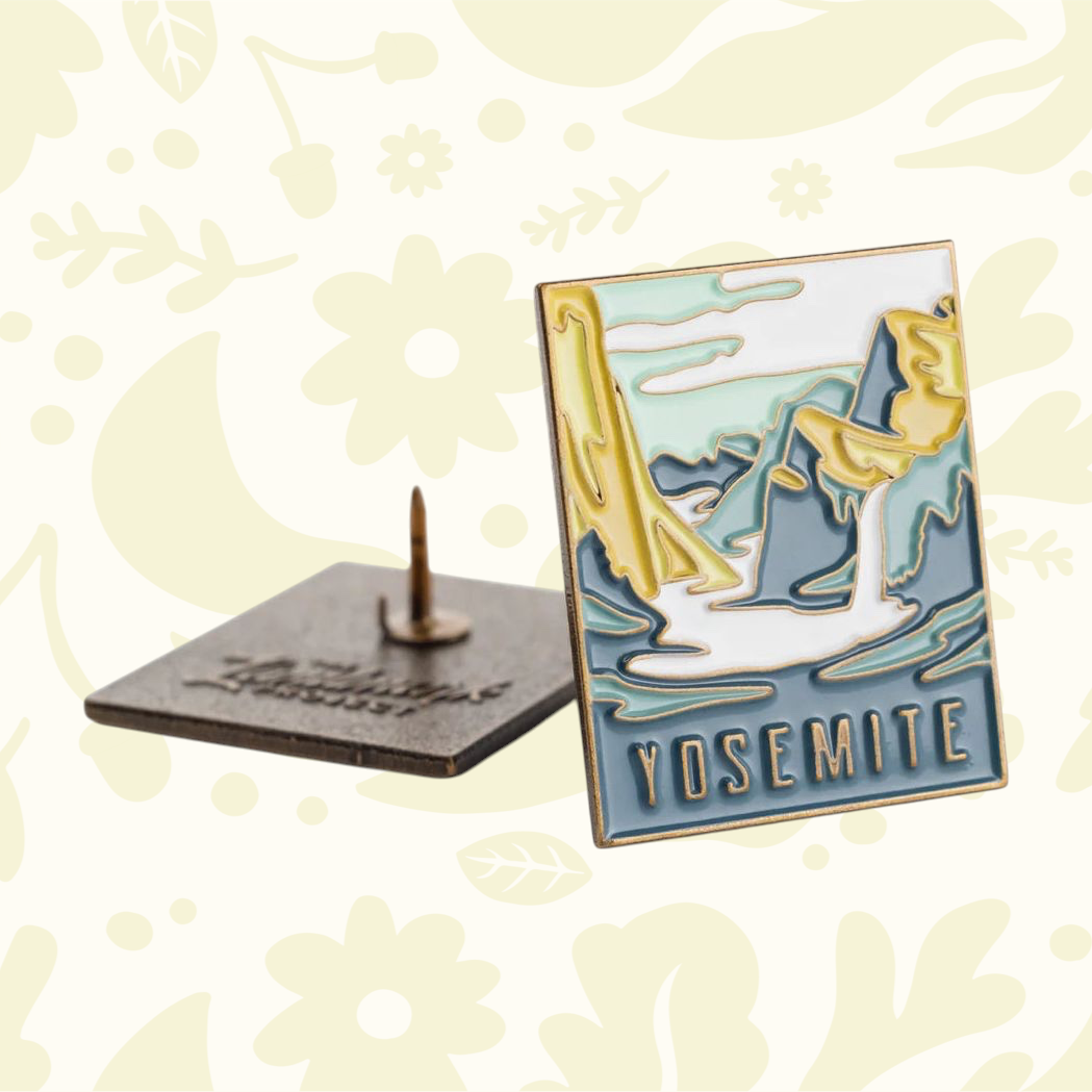 Forager Provisions LTD Yosemite National Park enamel pin featuring a scenic mountain landscape illustration