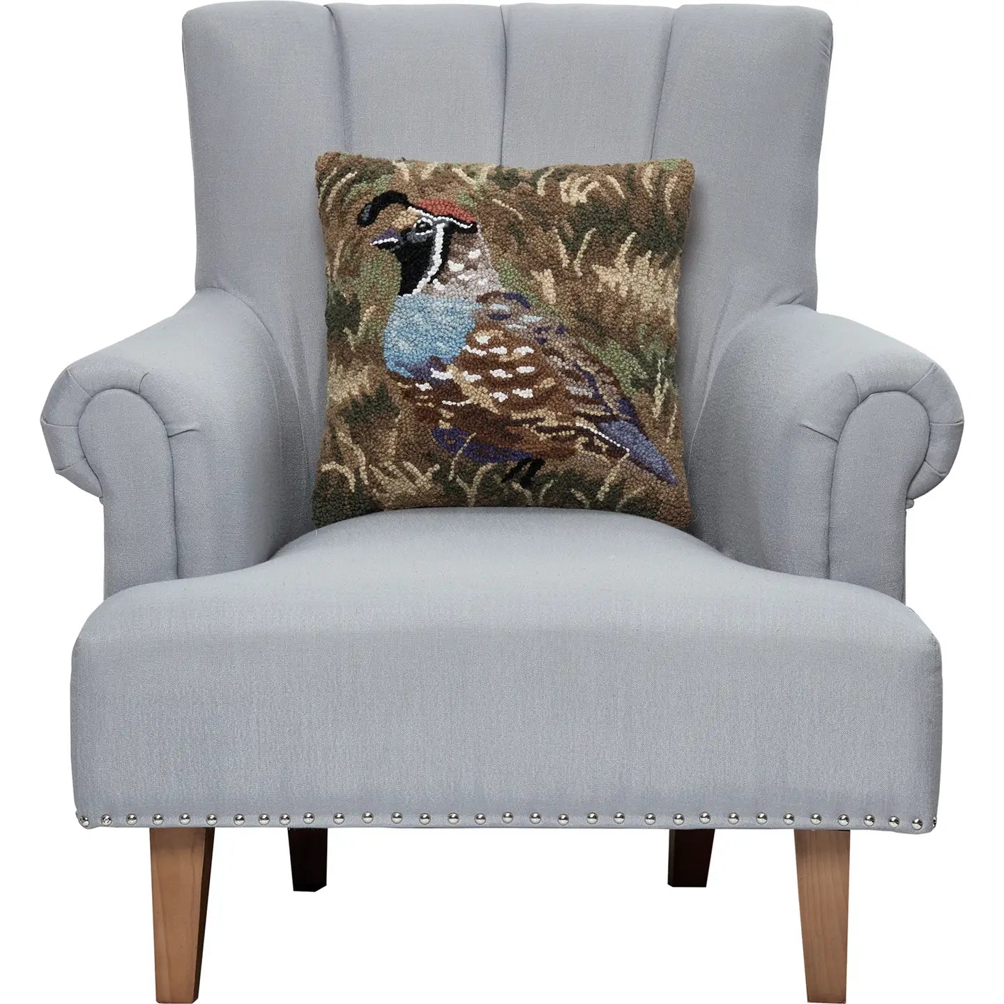 Modern light gray armchair with wooden legs, featuring a stylish 16x16 Peking Quail wool hooked cushion for cozy living rooms.