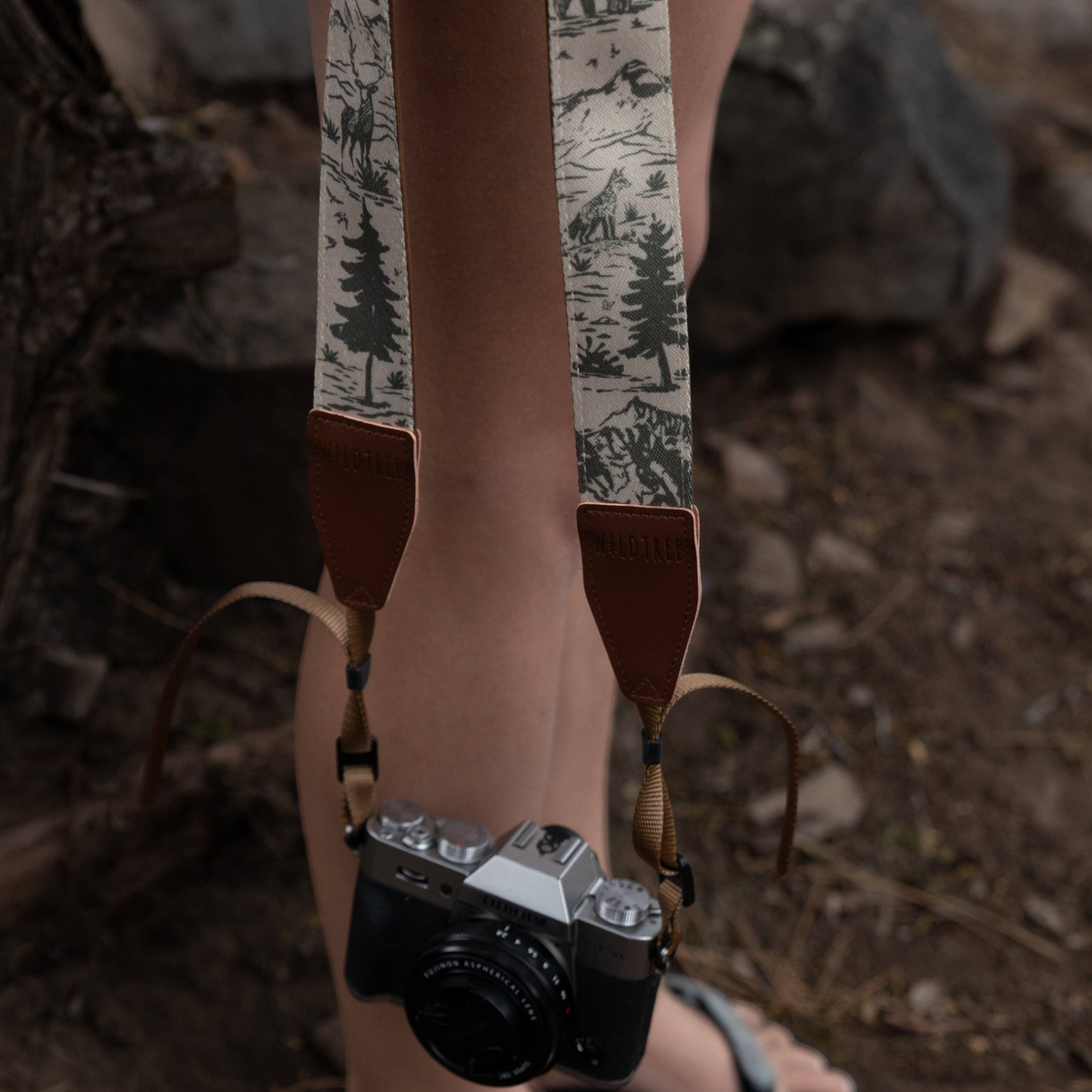 Forager Provisions LTD Wildtree camera strap with woodland mountain print, polyester webbing, and faux suede backing.