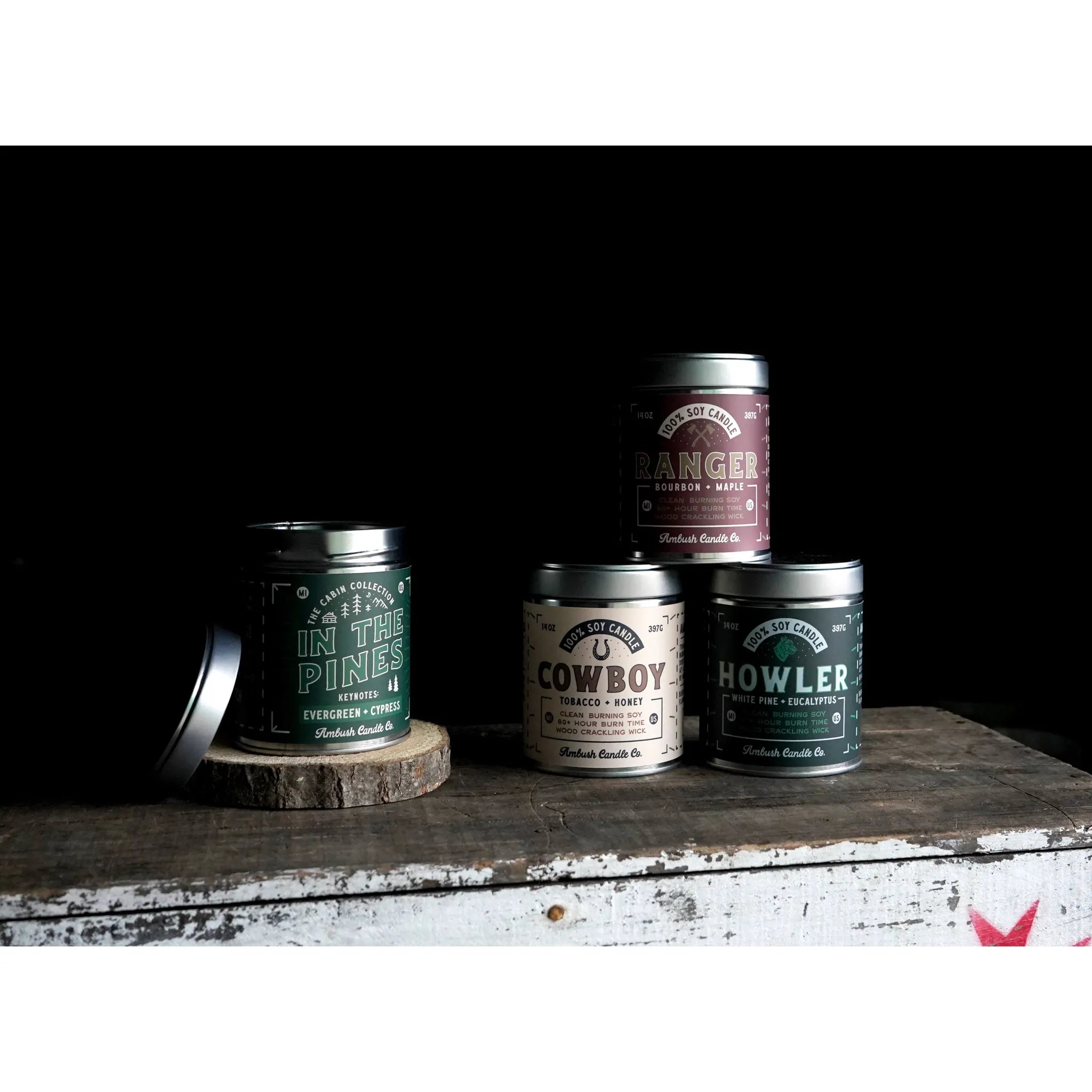 An Ambush Candle Co 14OZ Bourbon & Maple Ranger Candle, elegantly positioned on a rustic wooden shelf.