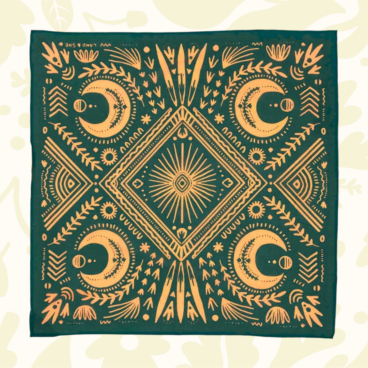 The Bandit Bandanas Stay Steady: square, cotton bandana with yellow moons, suns, plants—adventure style accessory for outdoors.