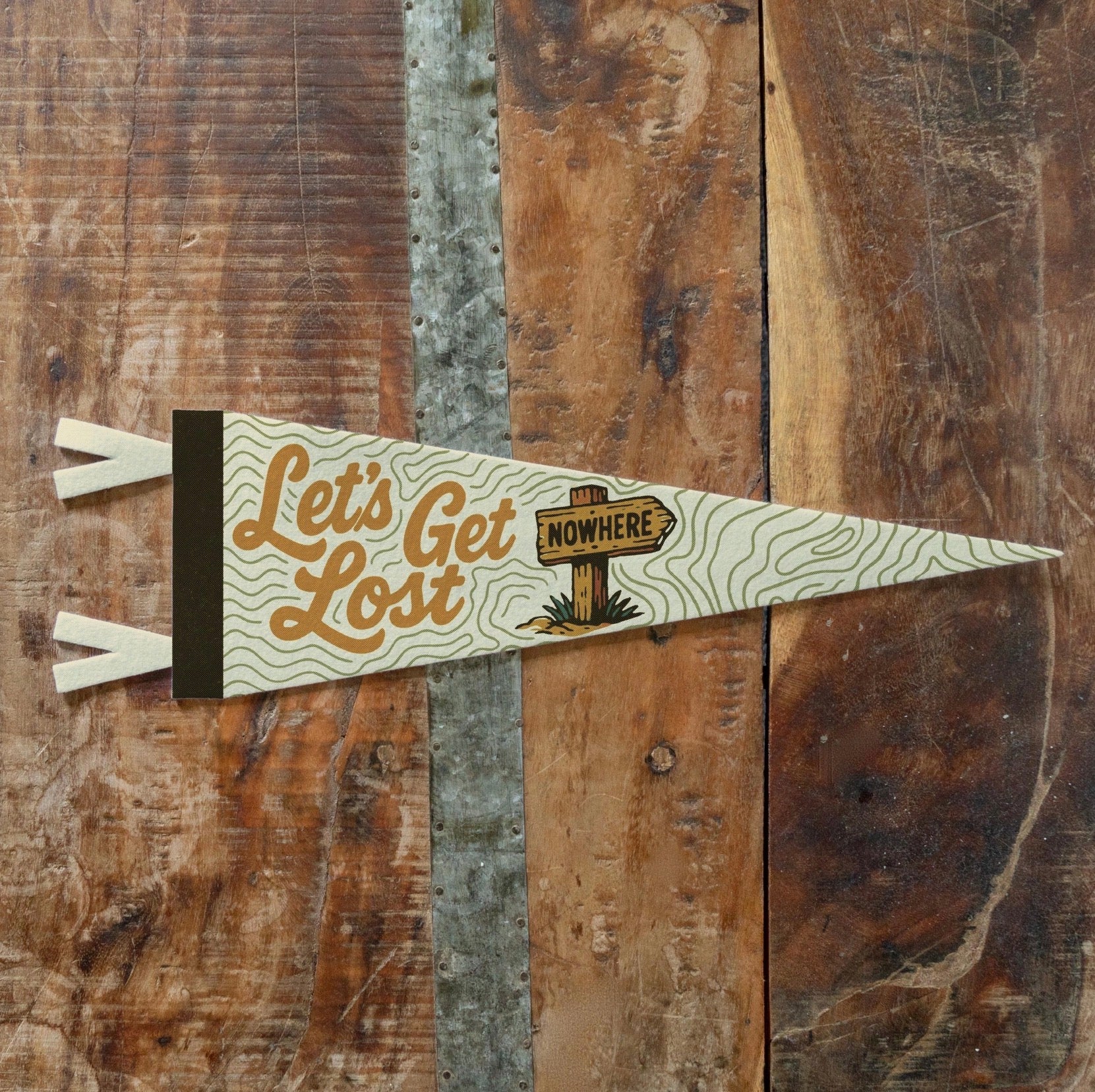 Benoit’s Let’s Get Lost Pennant 8x28.5” brings retro camp flag decor to your wall; perfect vintage touch for home styling.